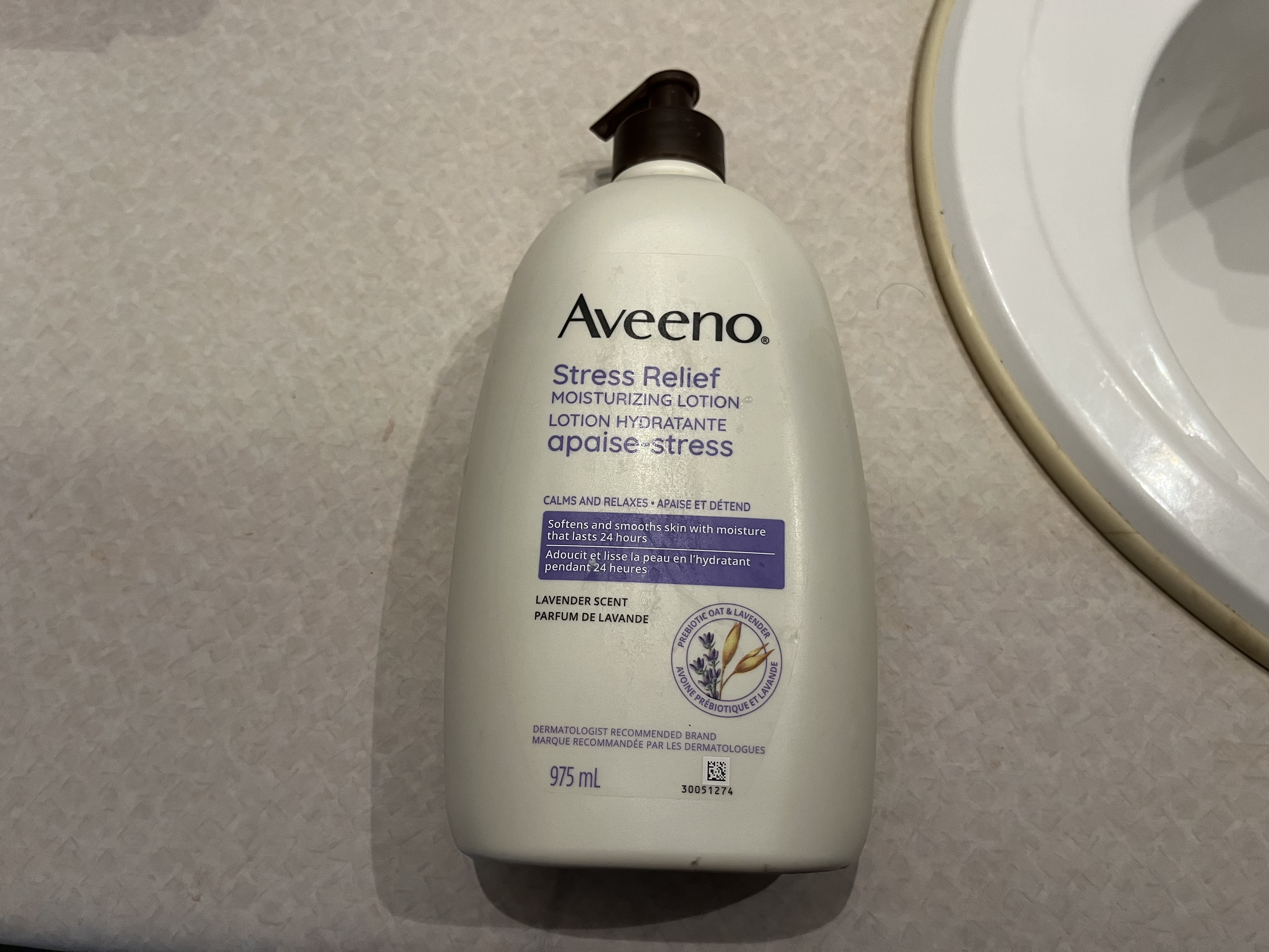 This is the sound of the lotion pump being pressed, dispensing the product with a soft, squishing motion.