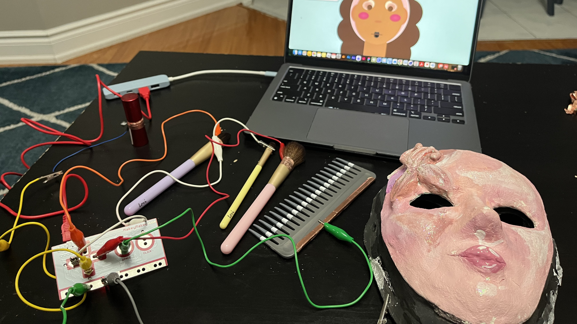 This is the full setup of my Makey Makey system with all my objects connected.