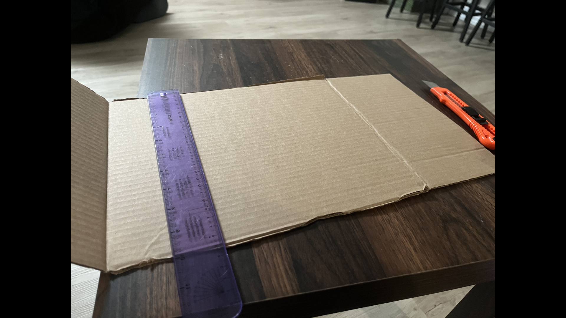 This is part of my setup. I used a cardboard cutter, ruler, and pencil to trace and cut out the guerrilla prototype brush.